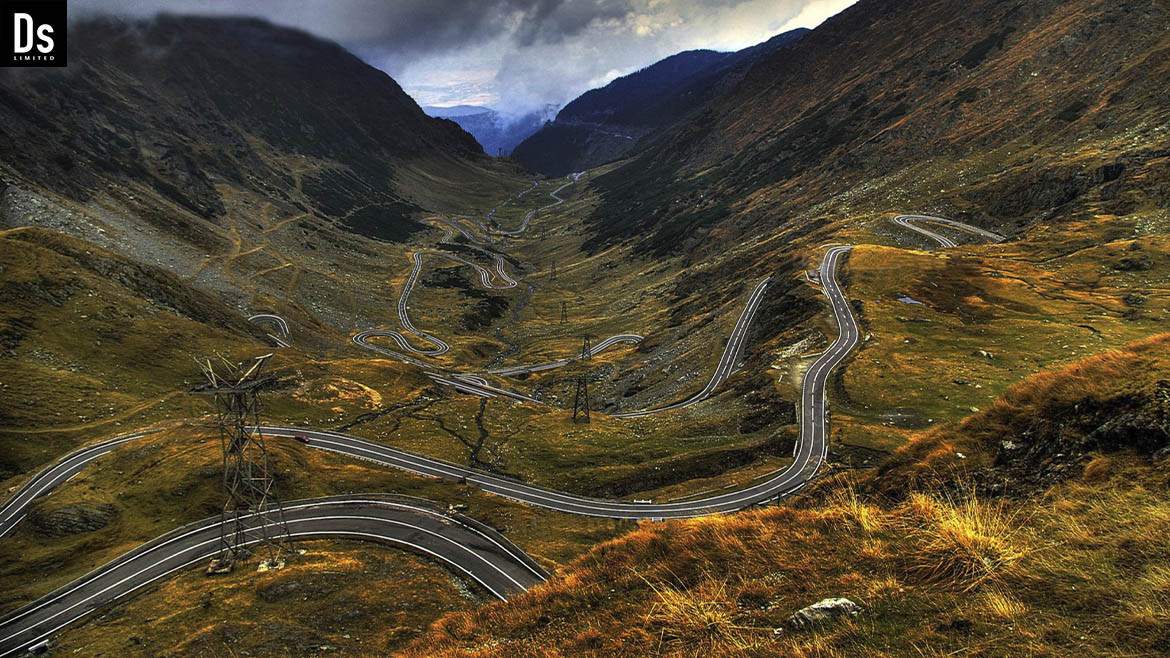 On that day, when Denys Dynamics first drove along the Transfăgărășan highway, his heart brimmed with excitement and awe at the grandeur of nature. With every twist of the road, new horizons unfolded before him, and with each kilometer, he felt his spirit soar with freedom.  As he gazed upon the majestic mountain peaks, the clouds seemed so close that he could almost reach out and touch them. It was an indescribable feeling—a blend of wonder and exhilaration, as if he had arrived at the edge of the world. The sight of the winding river below stirred within him a desire to stop and simply listen to its melodic flow.  At the summit, near Lake Bâlea, he was enveloped by a sense of tranquility and silence. The surface of the water reflected the sky, and he caught a glimpse of his own reflection, filled with hopes and dreams. In that moment, he felt he had discovered not just a physical place but an inner state he had long sought.  Every moment of this journey became a revelation—not only of nature but of himself. Denys realized that despite the daily hustle, there exist places capable of reconnecting a person to their true essence. With each passing minute, he felt a new understanding of life emerge, as if the mountains and roads whispered ancient secrets to him.  By the end of the day, as the sun slowly descended beyond the horizon, he carried away not just memories of breathtaking landscapes but also the sensation that the world was filled with wonders waiting to be uncovered. It was a day when his heart beat anew with vitality, and his eyes sparkled with light, ready for future discoveries.